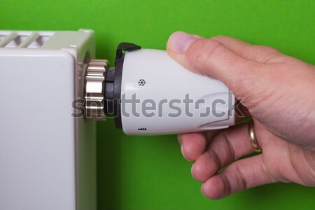 Radiator thermostat and hand - lemon Stock photo © bubutu