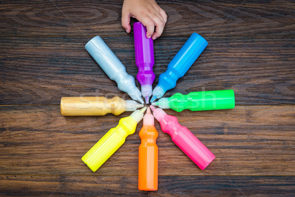 Bottles with colorful dry pigments on wooden background Stock photo © bubutu