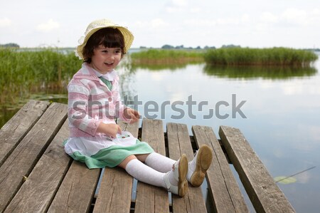 Lány portré ül híd tó gyerekek Stock fotó © Bumerizz