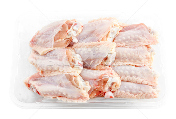 fresh Chicken middle wings in package isolate Stock photo © Bunwit