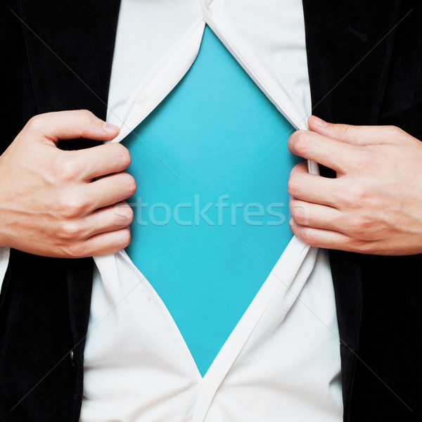 Businessman showing a copy space under his shirt Stock photo © burtsevserge