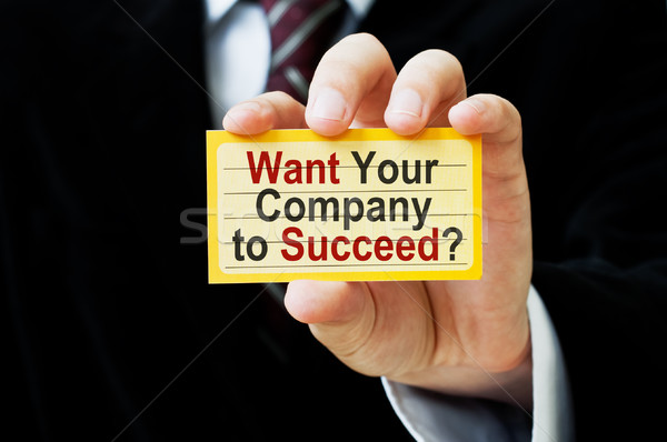 Cég siker üzletember tart kártya üzenet Stock fotó © burtsevserge