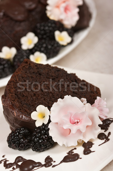 Torta csokoládés sütemény cukor virágok gyümölcs csokoládé Stock fotó © BVDC