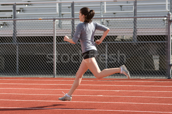 Atleta adolescente ejercicio velocidad carrera femenino Foto stock © BVDC