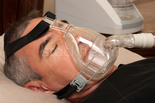 Dormir homem adormecido saúde medicina máscara Foto stock © BVDC