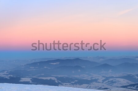 Tél hegy fa erdő naplemente hó Stock fotó © byrdyak