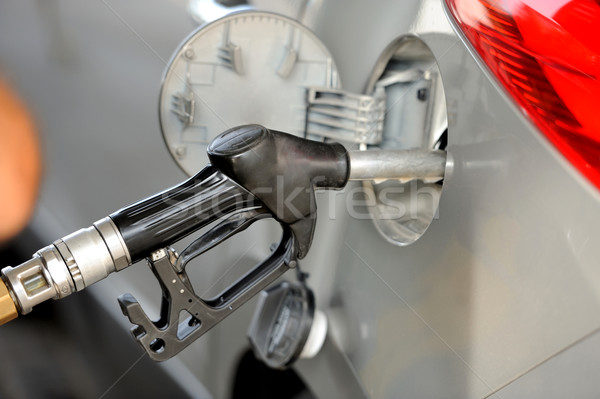 Car with a gas pump Stock photo © byrdyak