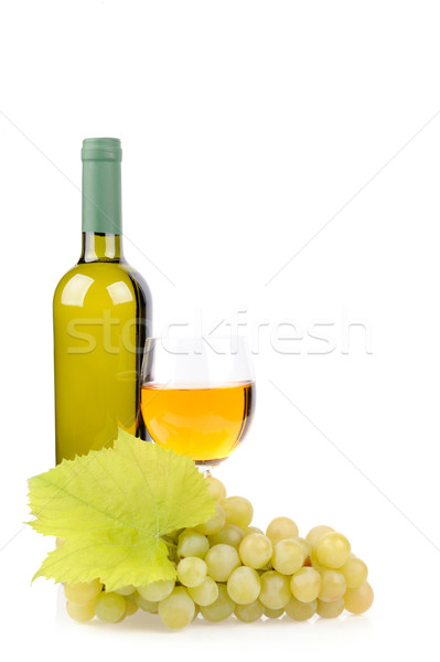 Wine bottle, glass and grapes Stock photo © byrdyak