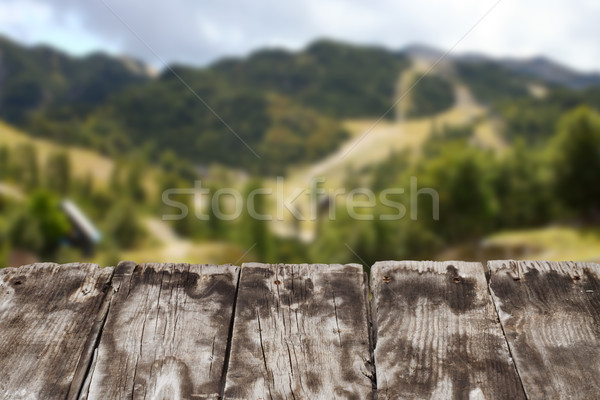 wooden board top and mountain Stock photo © c12