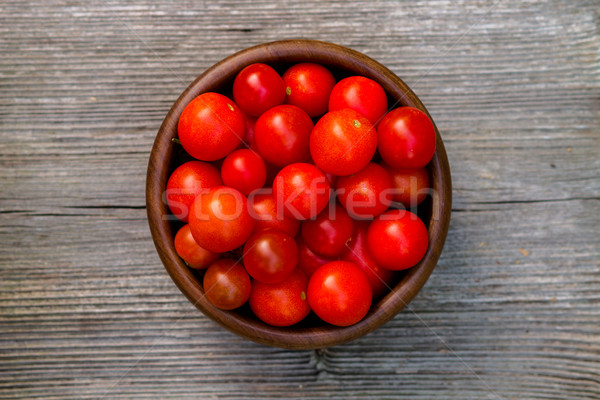 Tomaten kom houten tafel top voedsel Stockfoto © c12