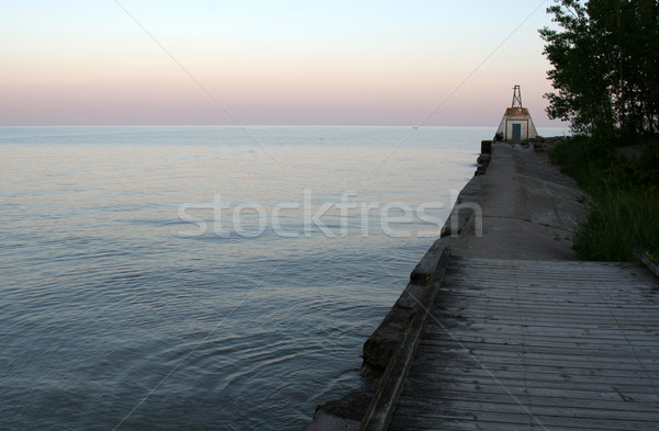 Sera dock vecchio faro shot albero Foto d'archivio © ca2hill