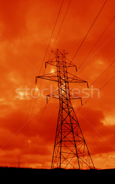 зловещий силуэта towers оранжевый небе Сток-фото © ca2hill