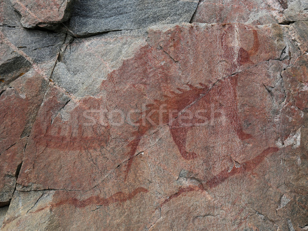 Stock photo: The Mishibizhiw or Great Lynx, along with canoes snakes, are part of the Agawa Rock Pictographs.  Th