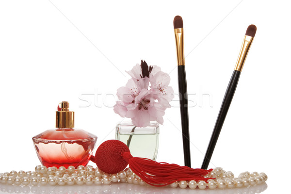 Pearls beads, perfume, two cosmetics brush Stock photo © caimacanul