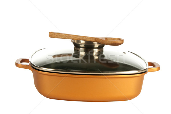 cookware, nonstick pan and wooden spoon Stock photo © caimacanul