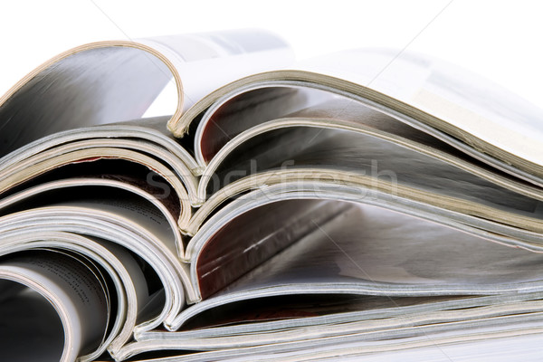 Köteg magazinok görbület oldalak öreg fehér Stock fotó © caimacanul