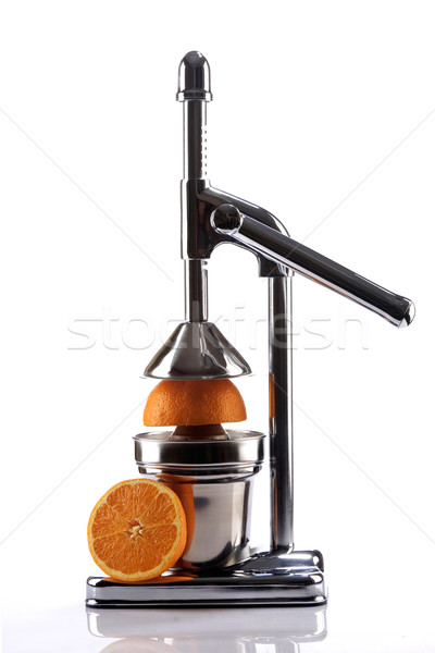 Chrome Citrus Juicer and Orange Halves Stock photo © caimacanul