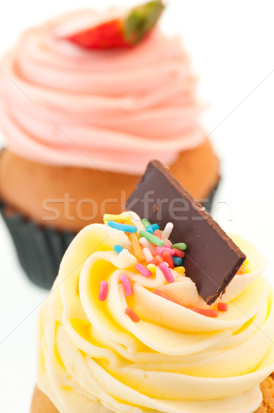 Vanilla cupcake topping close up over white background Stock photo © calvste