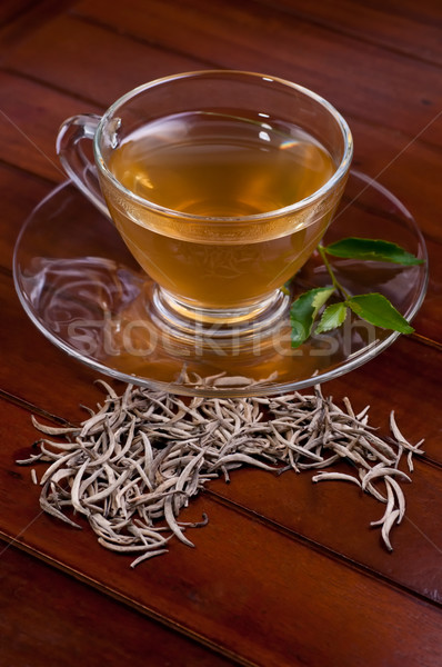 Silver tips tea on a wooden table Stock photo © calvste