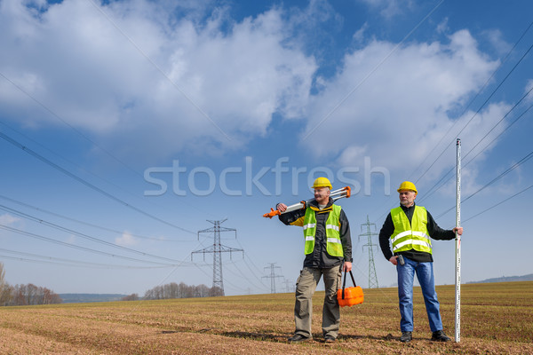 Geodesist two man equipment on construction site Stock photo © CandyboxPhoto