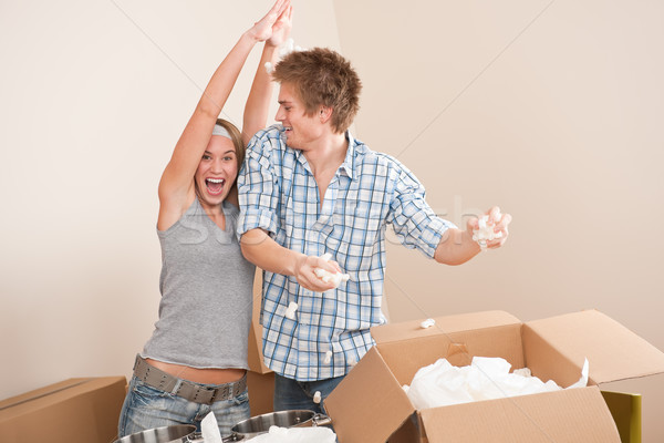 Moving house: Man and woman having fun Stock photo © CandyboxPhoto