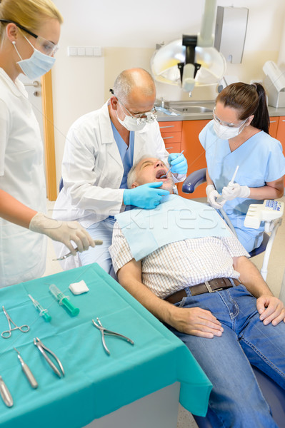 Senior man at dentist surgery have operation Stock photo © CandyboxPhoto