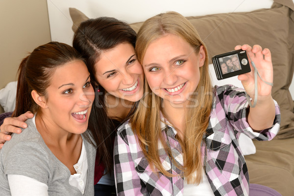 Smiling young girls taking self portrait Stock photo © CandyboxPhoto