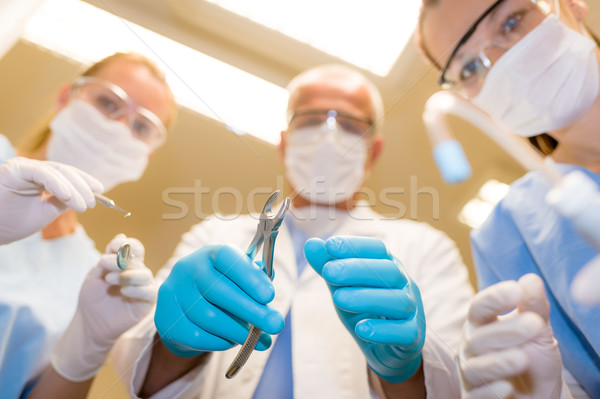 Zawodowych stomatologicznych zespołu działania dolny widoku Zdjęcia stock © CandyboxPhoto
