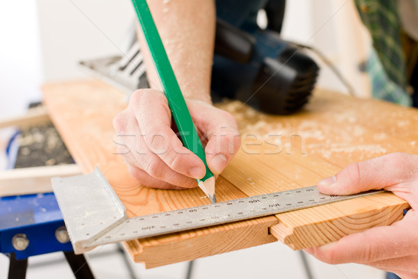 Stock photo: Home improvement - handyman prepare wooden floor