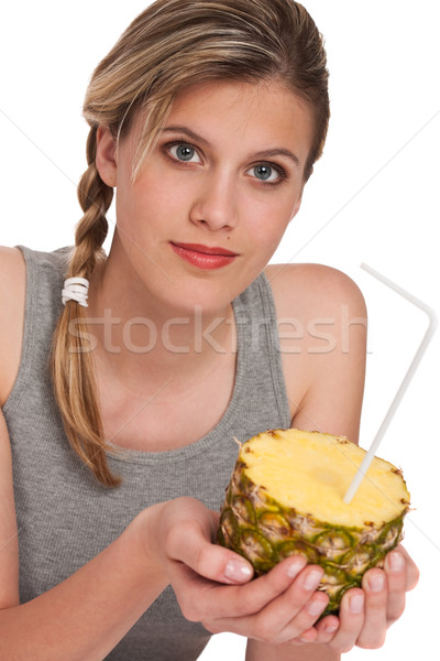 Stock photo: Healthy lifestyle series - Woman holding pineapple