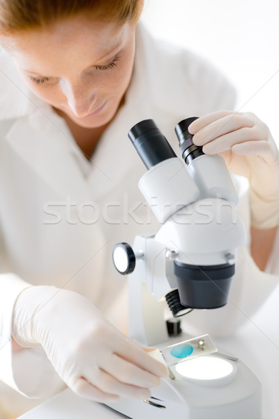 Stock photo: Microscope laboratory - woman medical research