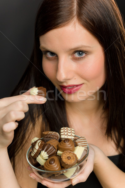 Chocolate - portrait young woman enjoy candy Stock photo © CandyboxPhoto