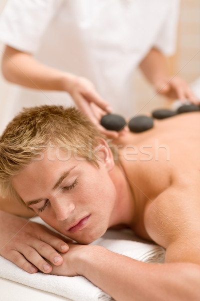 Lastone therapy - man at luxury massage  Stock photo © CandyboxPhoto