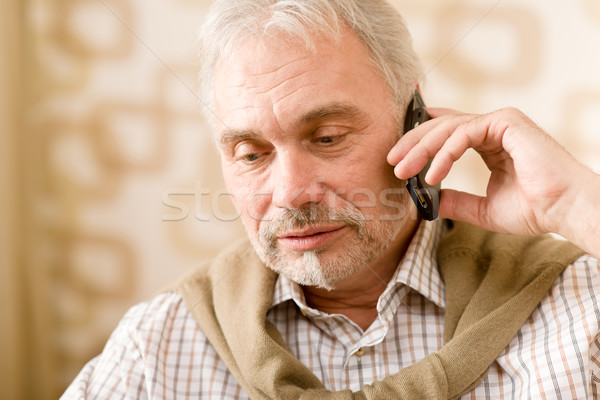 Zamyślony starszy dojrzały mężczyzna telefonu komórkowego połączenia Zdjęcia stock © CandyboxPhoto