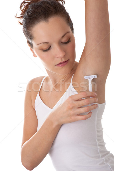 Body care series - Young woman shaving armpit Stock photo © CandyboxPhoto