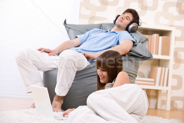 Student - Happy teenager with laptop relaxing Stock photo © CandyboxPhoto