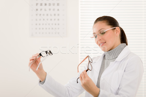 Optician doctor woman with glasses and eye chart Stock photo © CandyboxPhoto