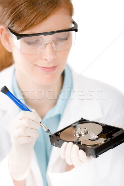 Female computer engineer - woman repair hard disc Stock photo © CandyboxPhoto