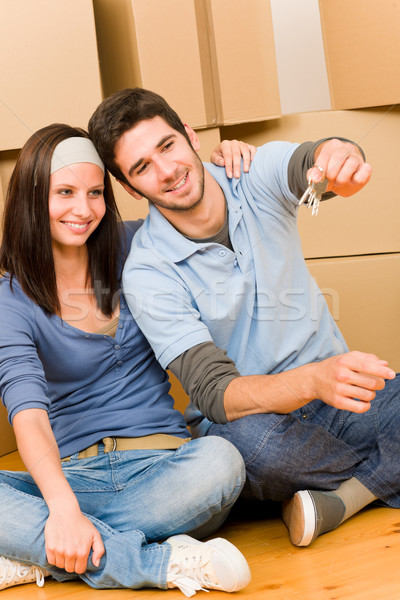 Moving new home young couple hold keys Stock photo © CandyboxPhoto
