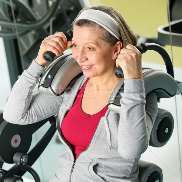 Fitness center senior woman exercise smiling Stock photo © CandyboxPhoto