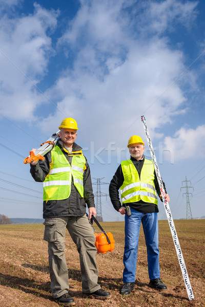 Geodesist two man equipment on construction site Stock photo © CandyboxPhoto