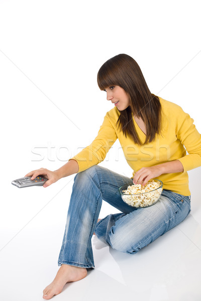 Boldog női tinédzser tv nézés tart távirányító Stock fotó © CandyboxPhoto