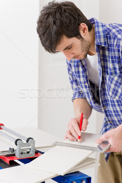 Home improvement - handyman cut tile Stock photo © CandyboxPhoto