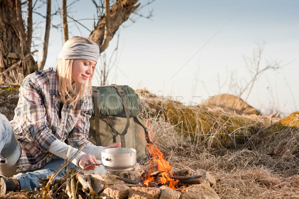 Hiking woman with backpack cook by campfire Stock photo © CandyboxPhoto
