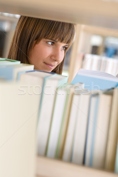 Student in library - happy woman study from book Stock photo © CandyboxPhoto