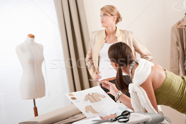 Fashion model fitting clothes by professional designer Stock photo © CandyboxPhoto