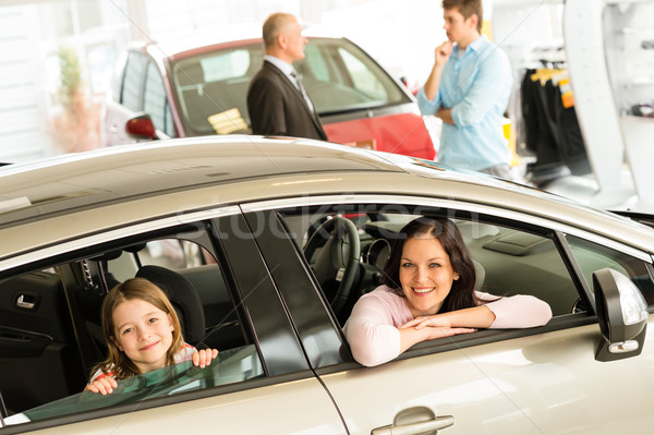 Mother and daughter trying car in dealership Stock photo © CandyboxPhoto