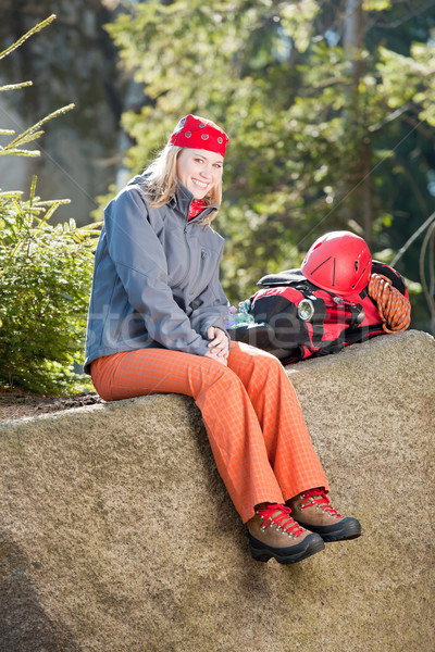 Active woman rock climbing sitting backpack Stock photo © CandyboxPhoto