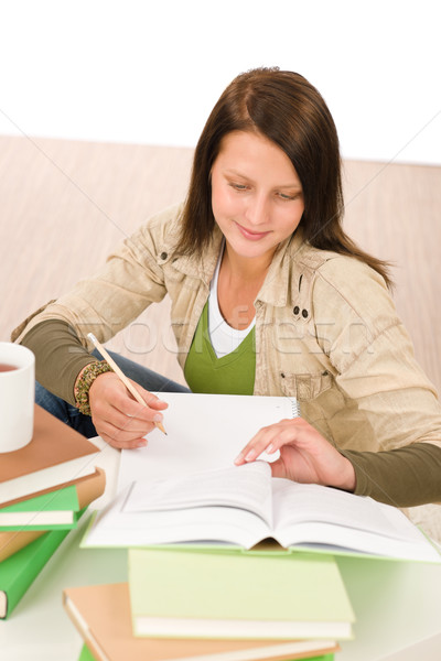 Student tiener meisje schrijven huiswerk boek Stockfoto © CandyboxPhoto
