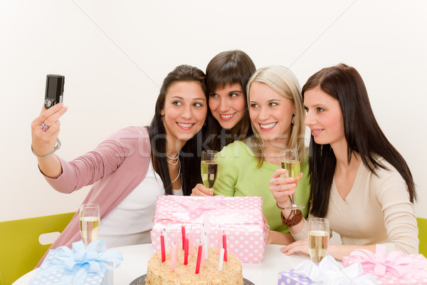 Birthday party - cheerful woman take photo with camera Stock photo © CandyboxPhoto